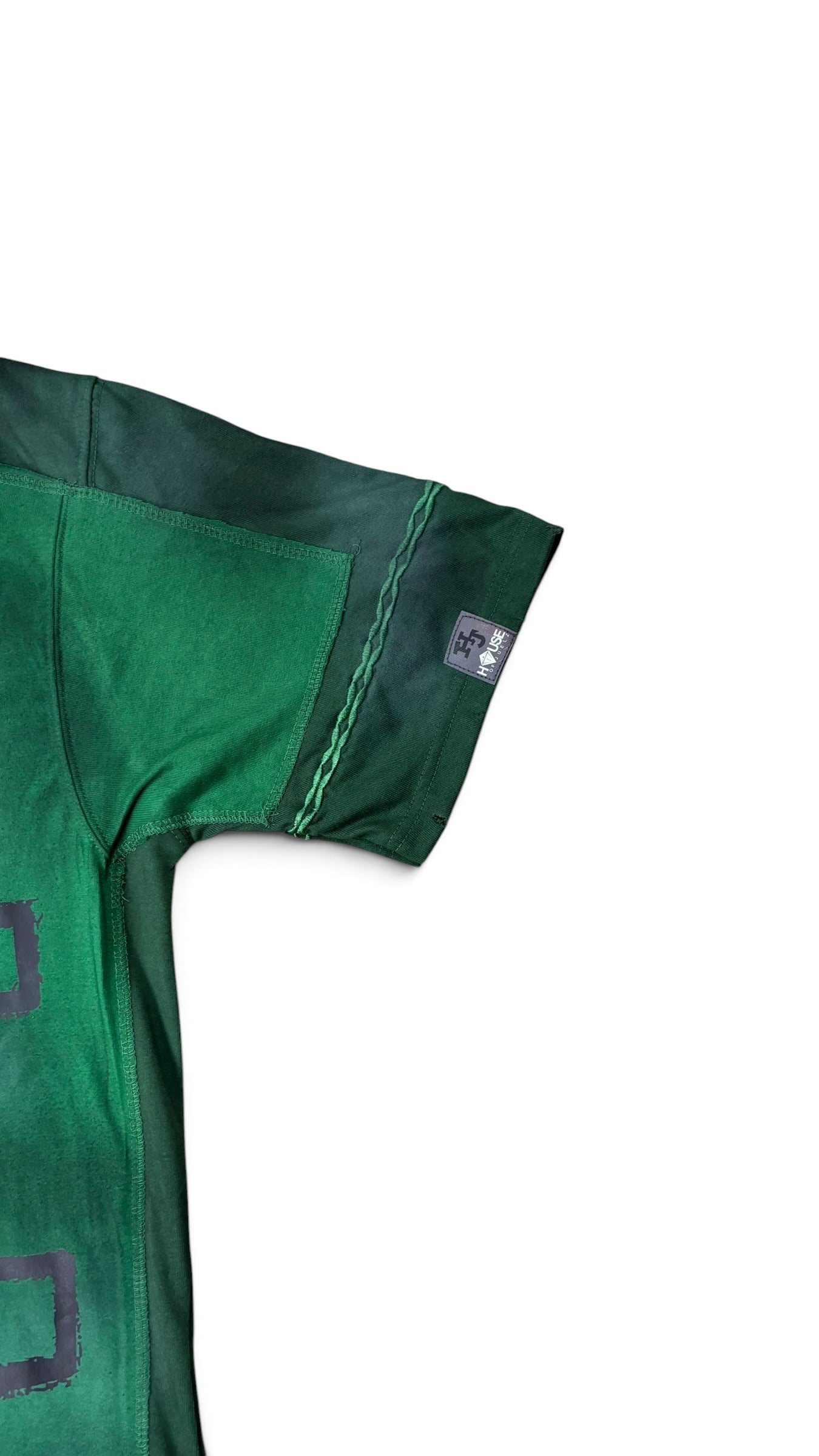 House of Juelz green double layer shirt sleeve stitching and label detail